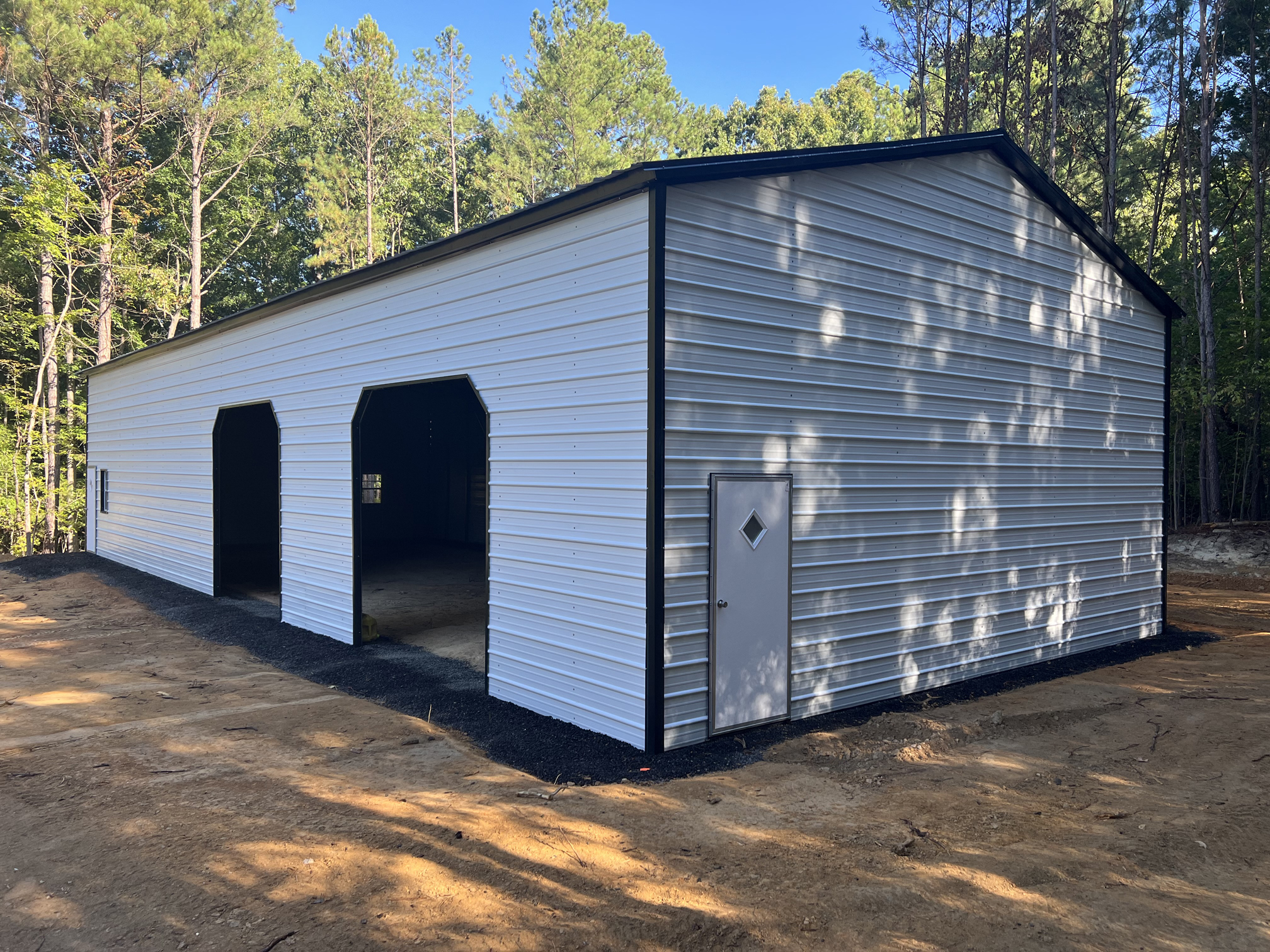 Fully Enclosed Two Bay Side Entry Garage 30' x 71' x 14'